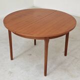 Round extendable teak table 1970