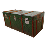 Vintage wooden and metal green travel trunk, circa 1930.
