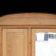 Art Nouveau wardrobe in blond wood with beveled mirror (circa 1909).