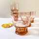 Pitcher and 6 water glasses in pink glass