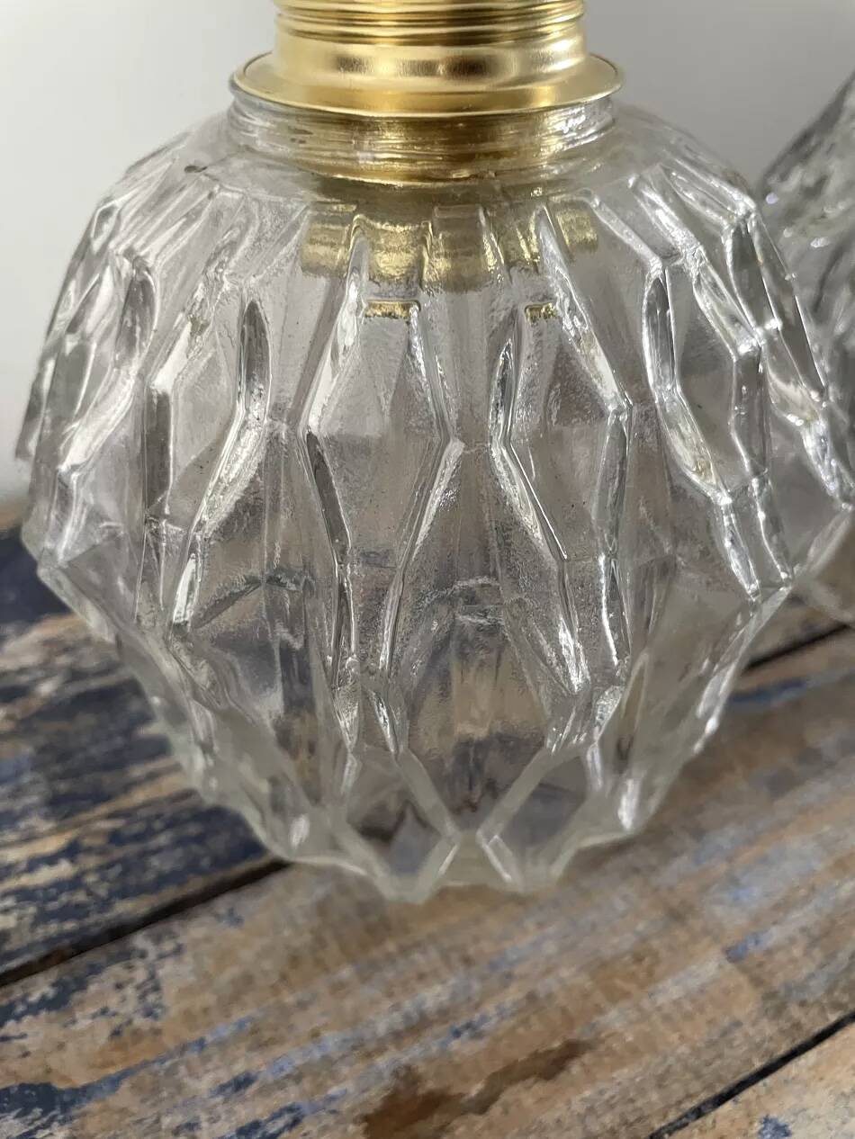 Pair of chiseled glass wall sconces