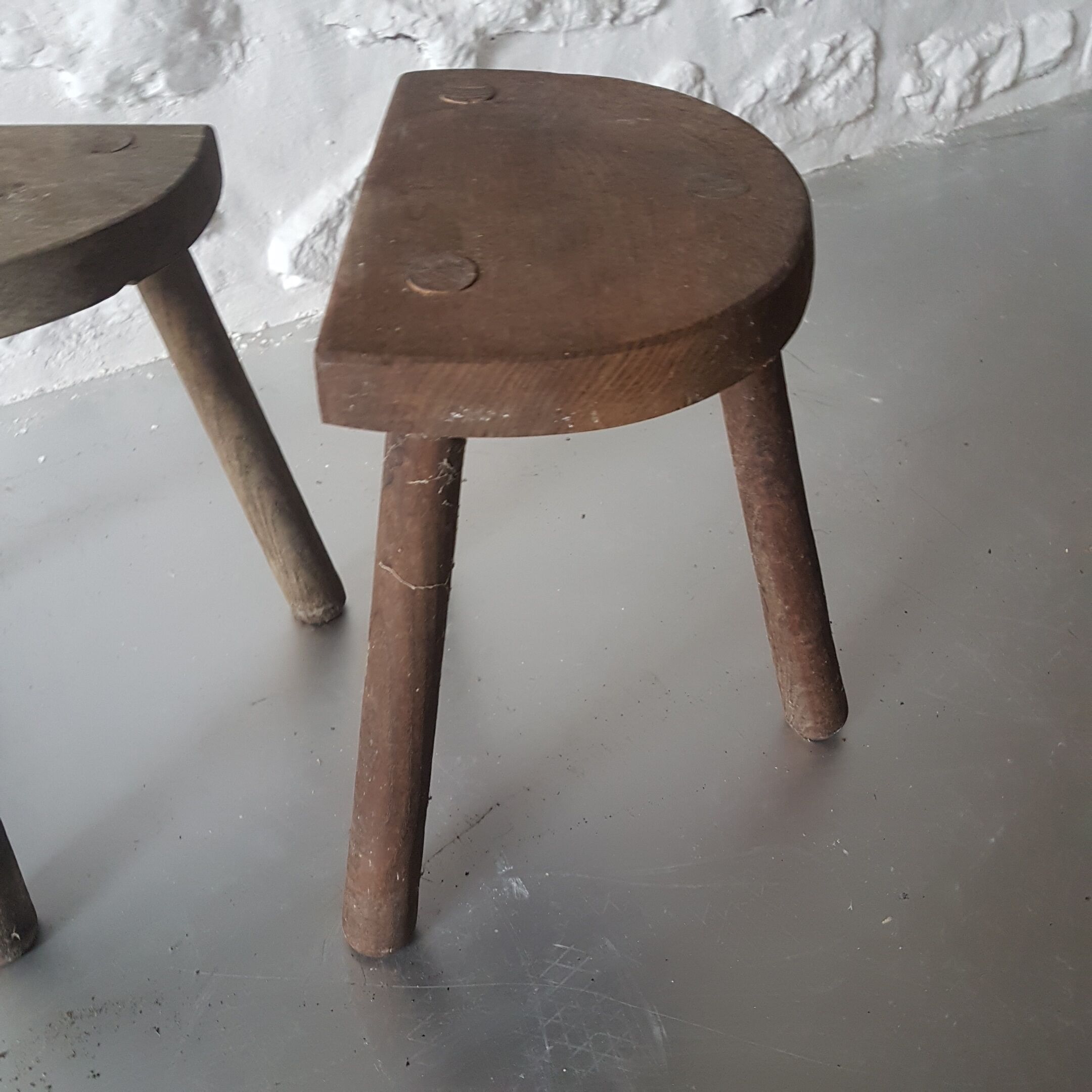 Pair of tripod farm wooden stool