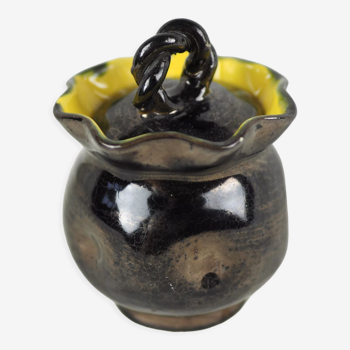 Iridescent black ceramic box yellow interior surmounted by a twisted handle - Vallauris - 50s