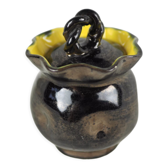 Iridescent black ceramic box yellow interior surmounted by a twisted handle - Vallauris - 50s