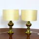 Pair of Luxus Uno & Osten gold lamps with silk shades.