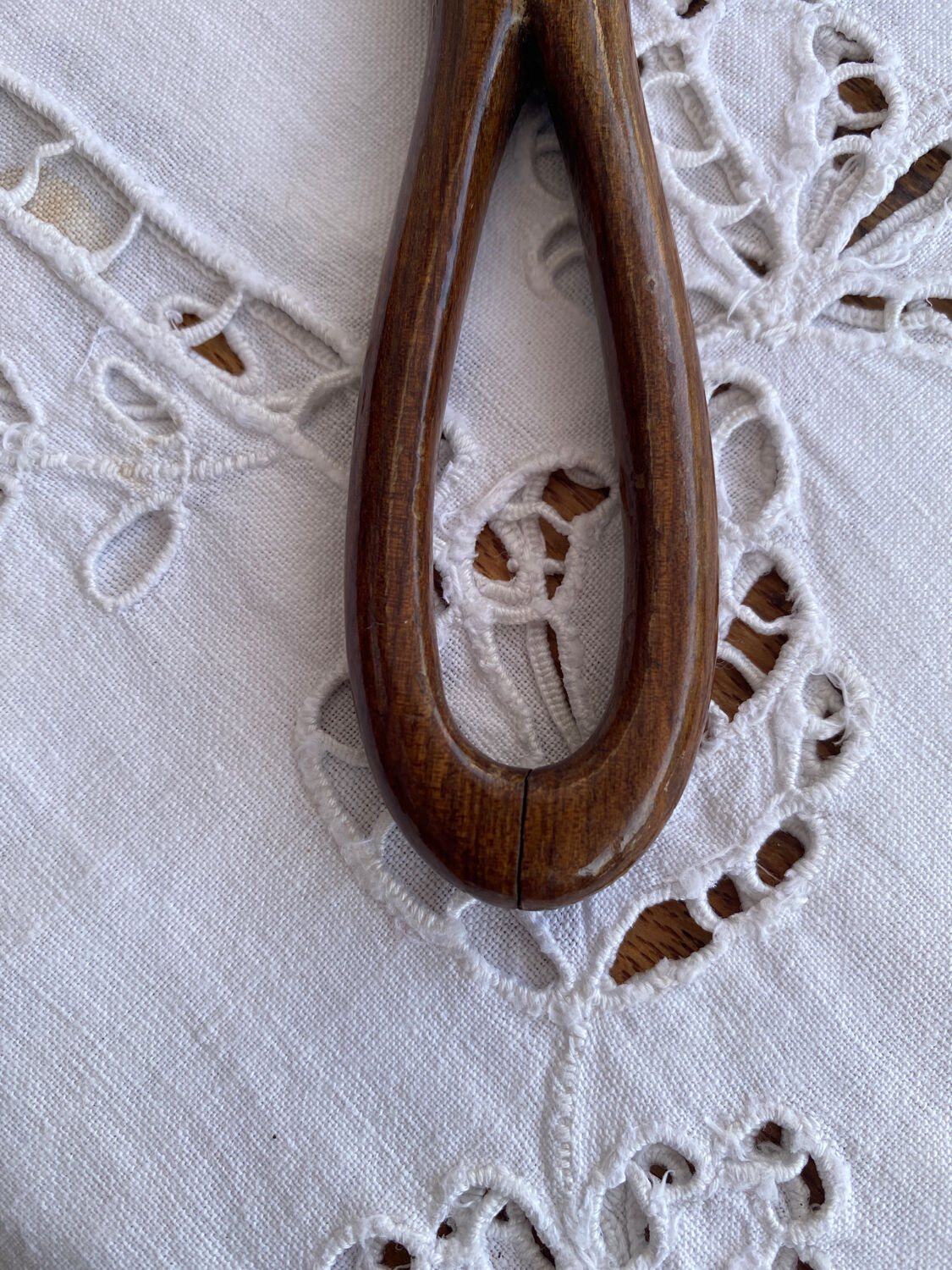 Hand-facing wooden mirror