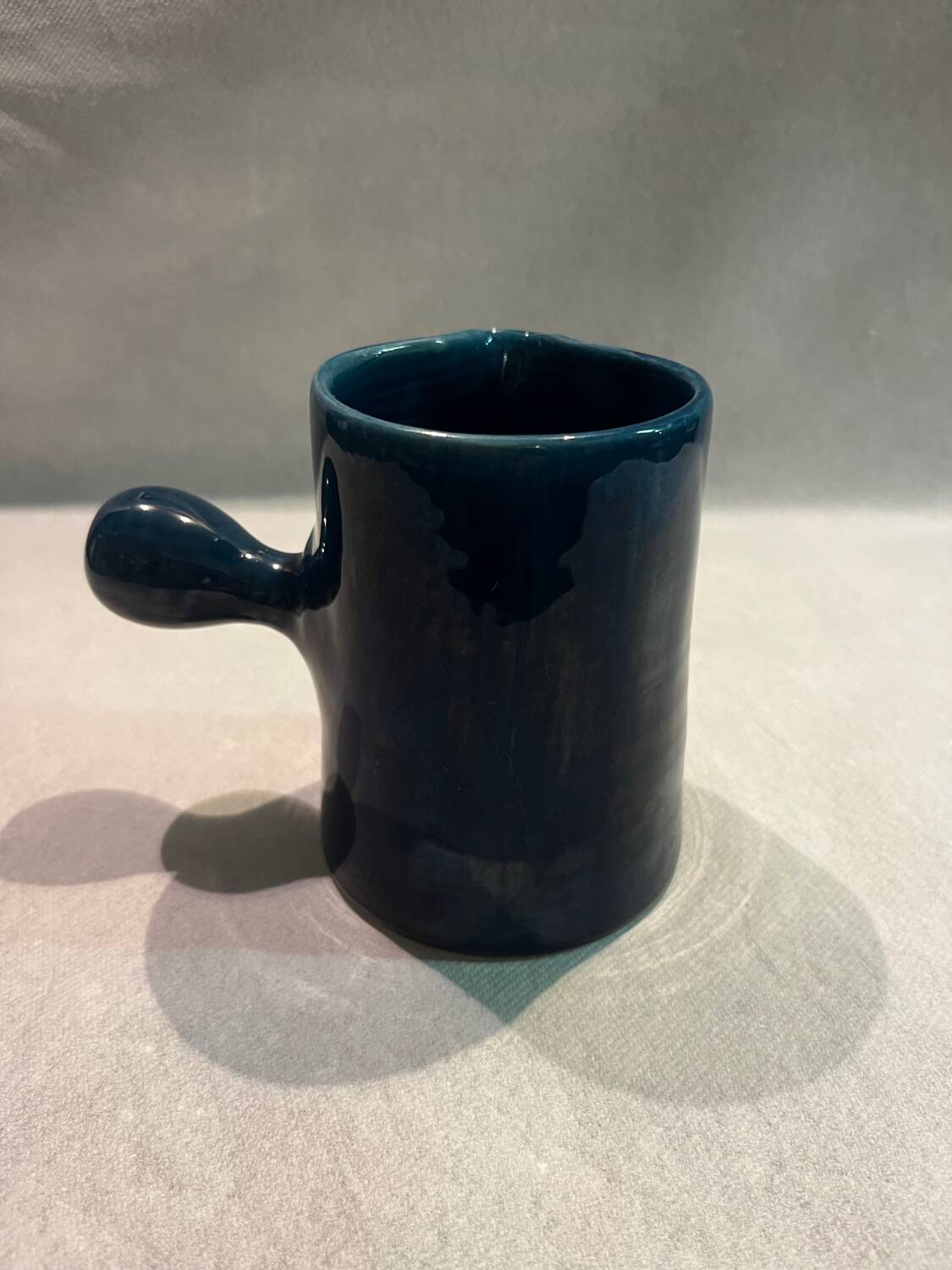 Blue ceramic milk jug
