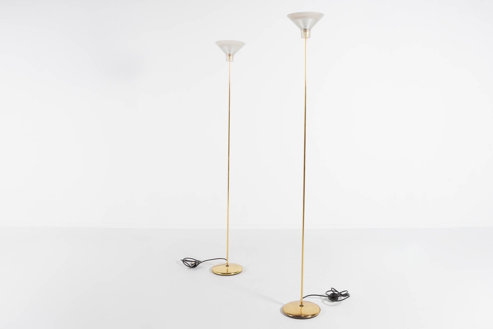 Pair of Italian golden floor lamps with glass shade, 1970’s