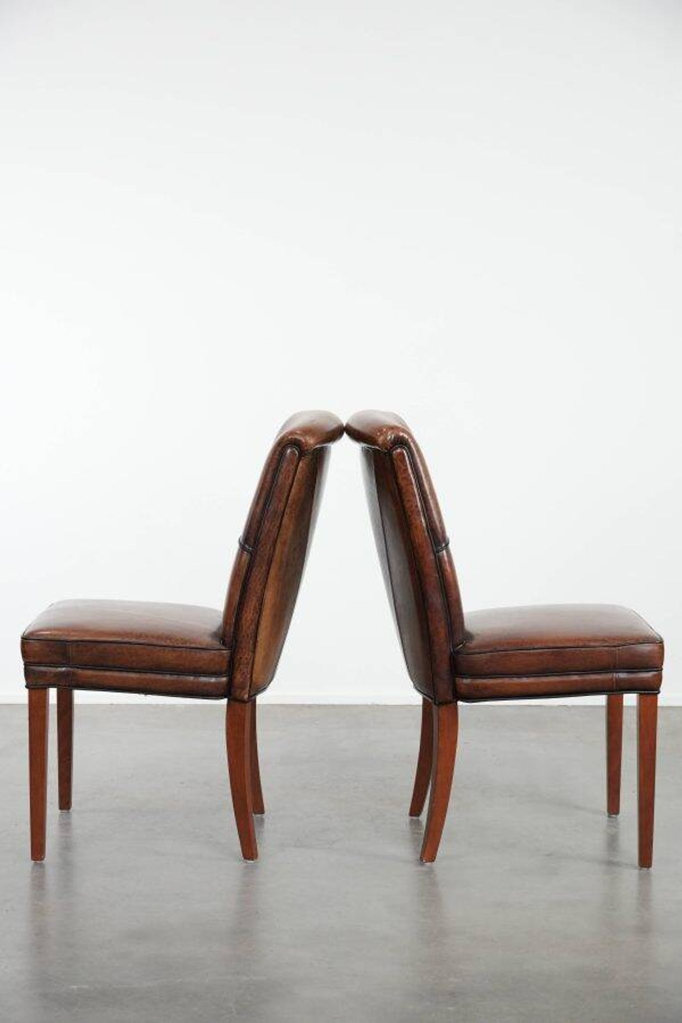 Comfortable set of 2 sheep leather dining chairs with character