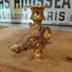 Vintage gold metal boar hunting candlestick
