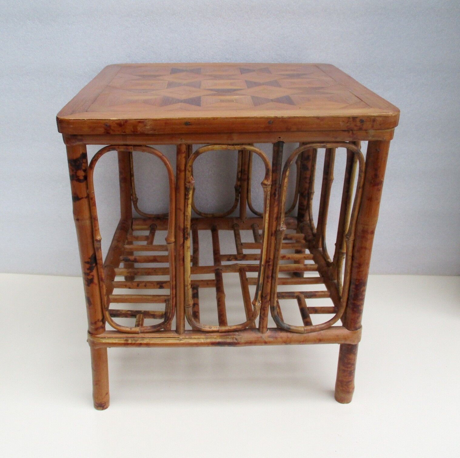 Vintage bamboo coffee table. Marquetry top