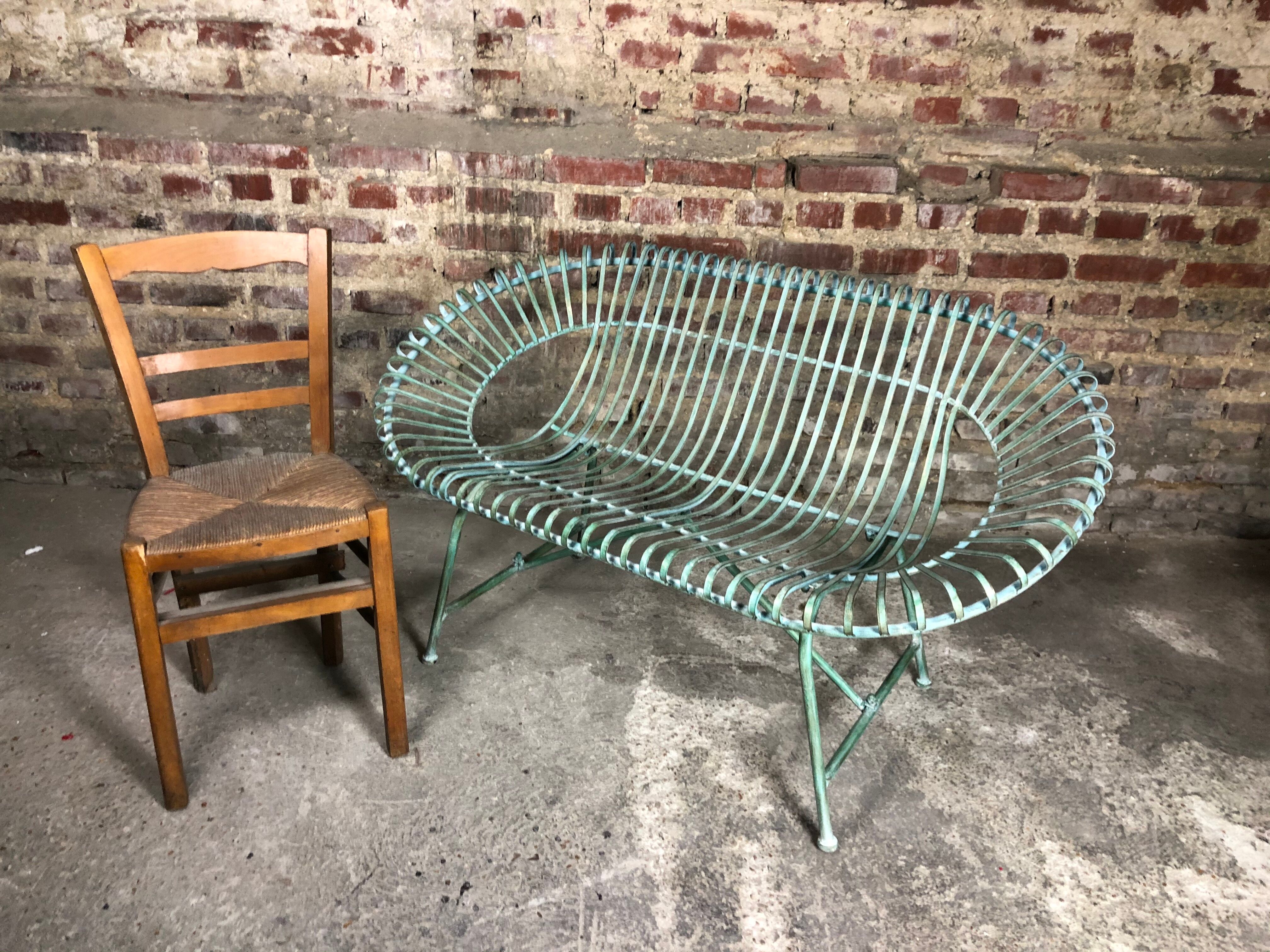 Green patinated iron garden bench