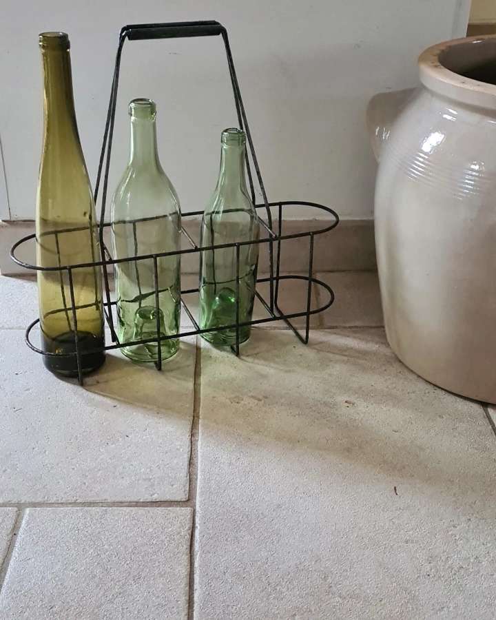 Old metal bottle holder