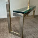 Console "G" by Belgochrom in brass and glass from the 1970s.