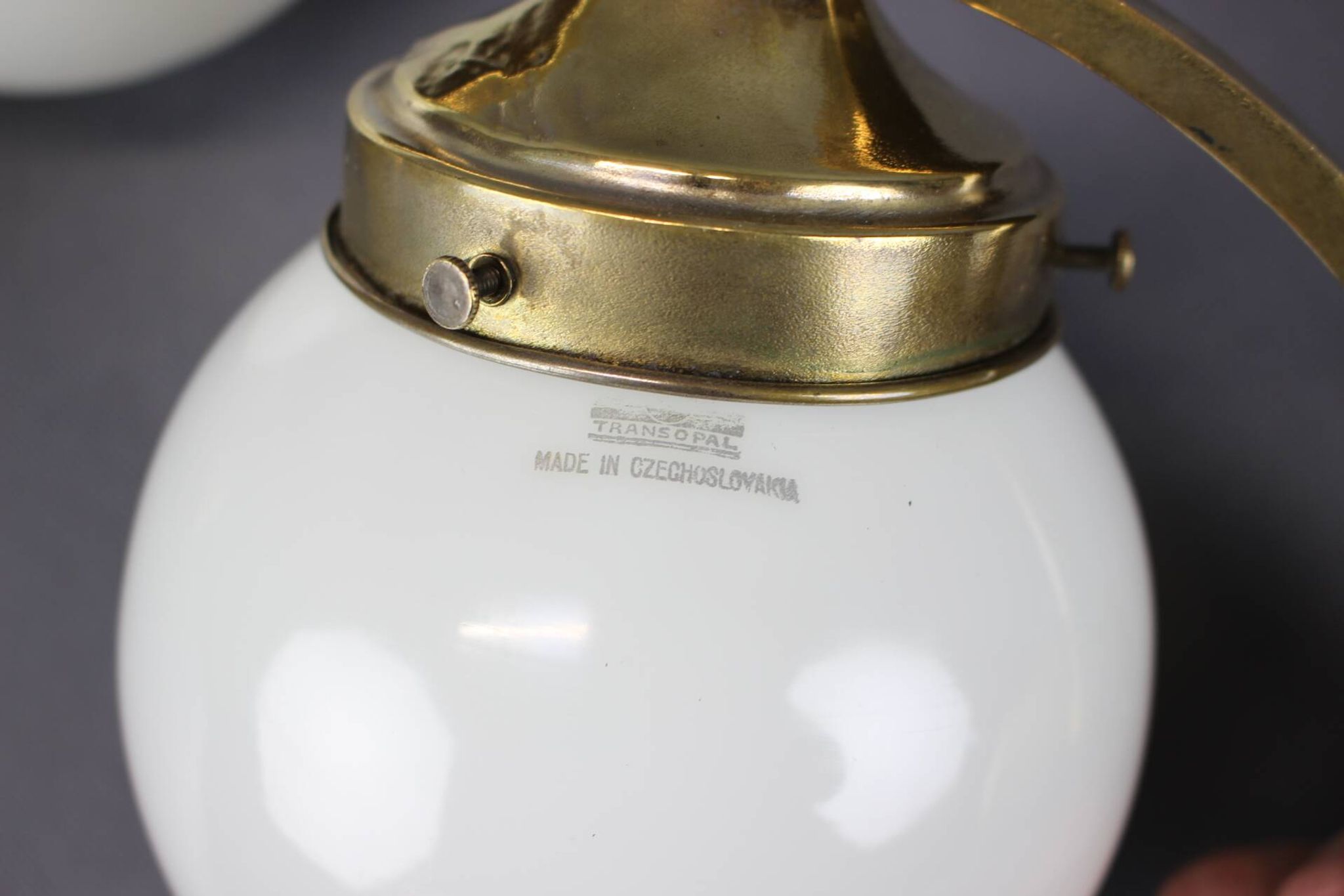 Pair of Art Deco wall sconces in brass and opaline glass, Europe, 1930s