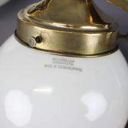 Pair of Art Deco wall sconces in brass and opaline glass, Europe, 1930s