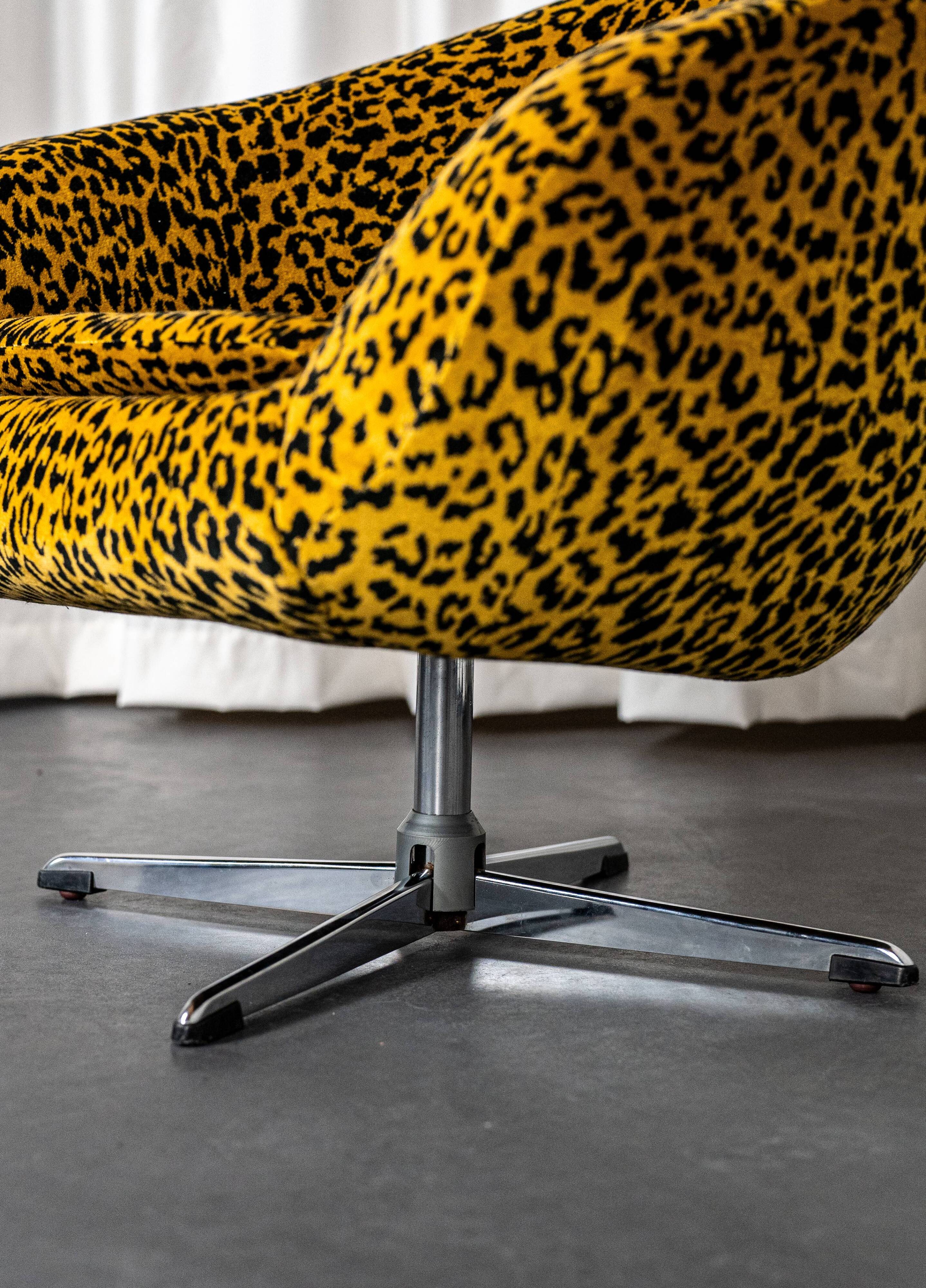 Vintage swivel shell armchair