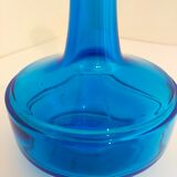 Bottle of old perfume of blue color