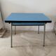 Table, chairs and stool in formica.