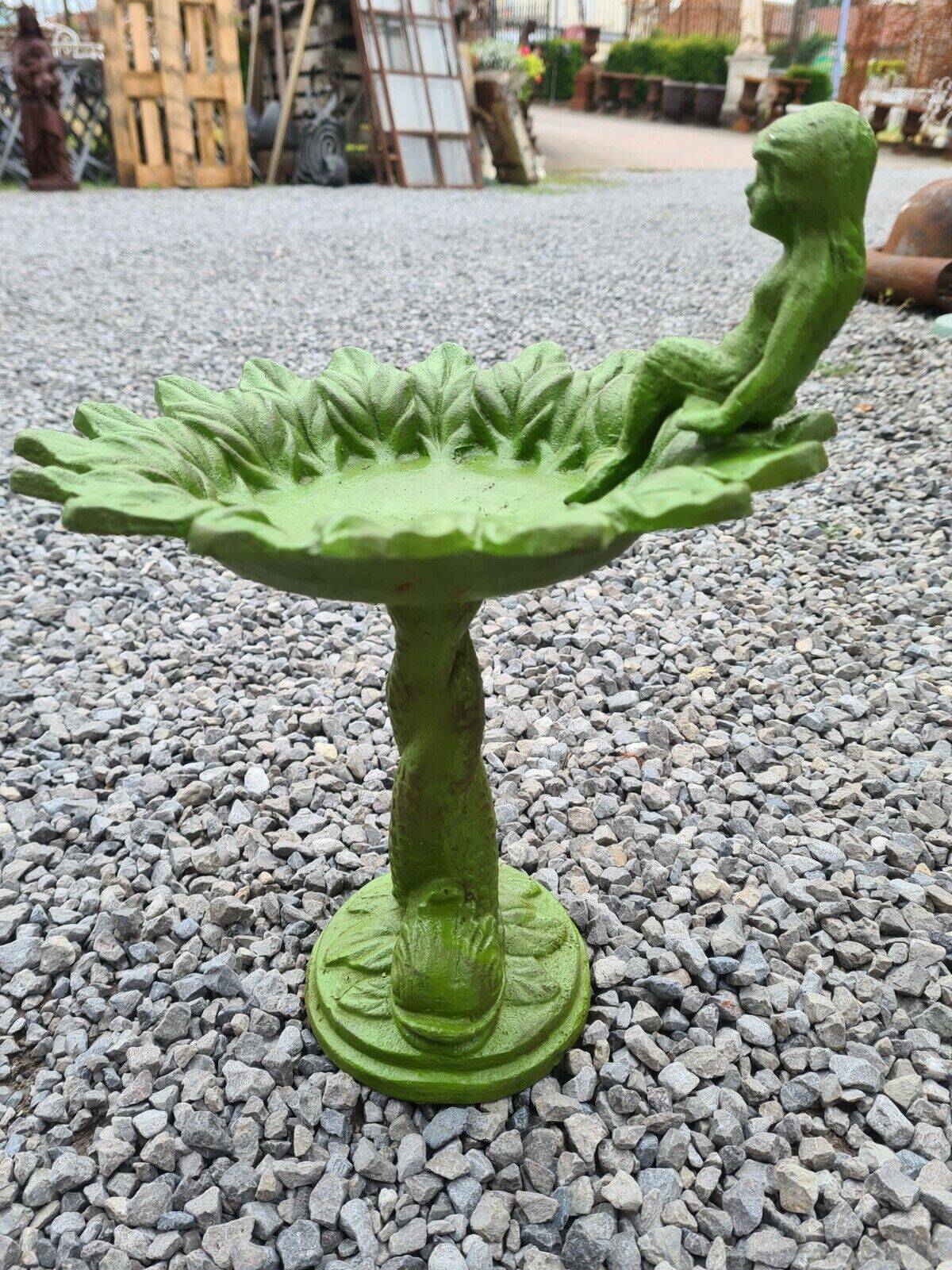 Cast iron birdbath with a mermaid