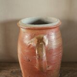 Terracotta pot with rounded handle