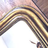 Old large Louis Phillipe mirror, gilded with gold leaf - Emilien"