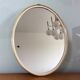 Free-form oval sheathed mirror from the 60s and 70s