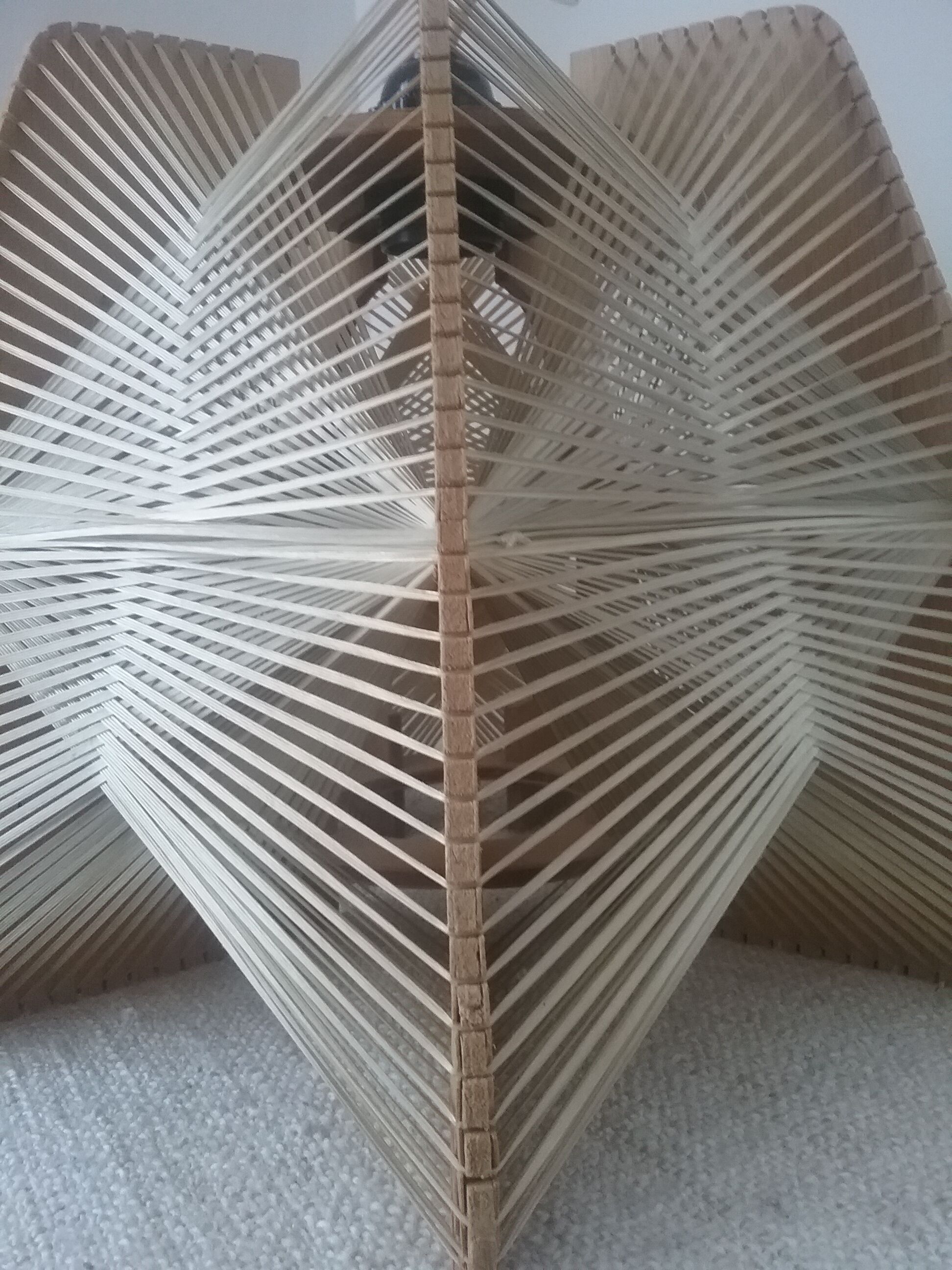Hanging lamp of wood and thread Scandinavian style