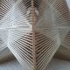 Hanging lamp of wood and thread Scandinavian style