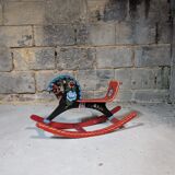 Painted wooden rocking horse