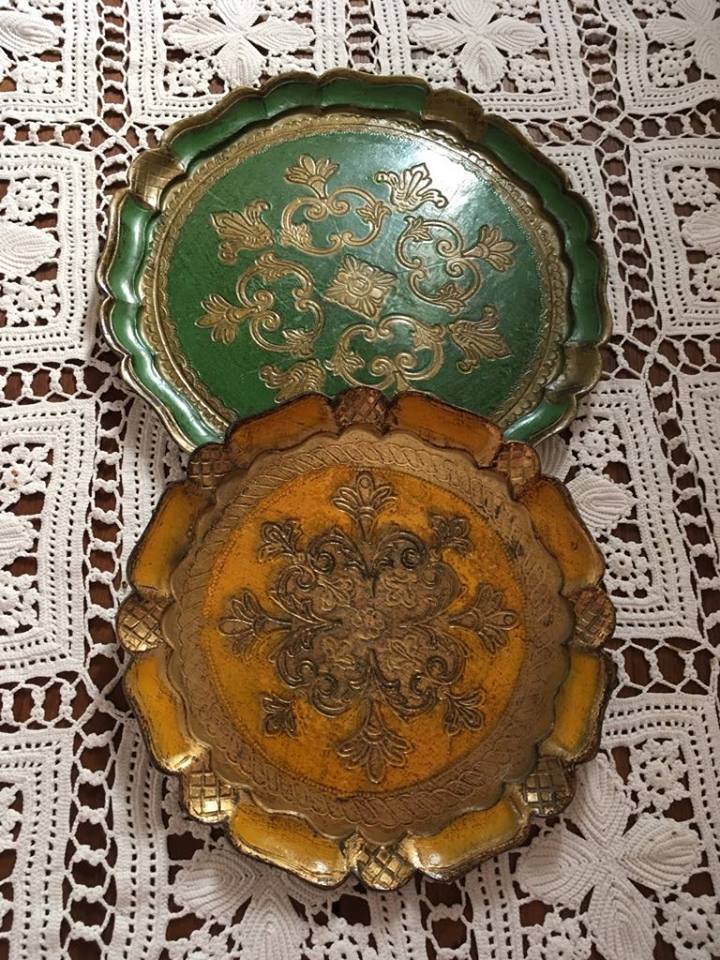 Two Florentine round table tops.