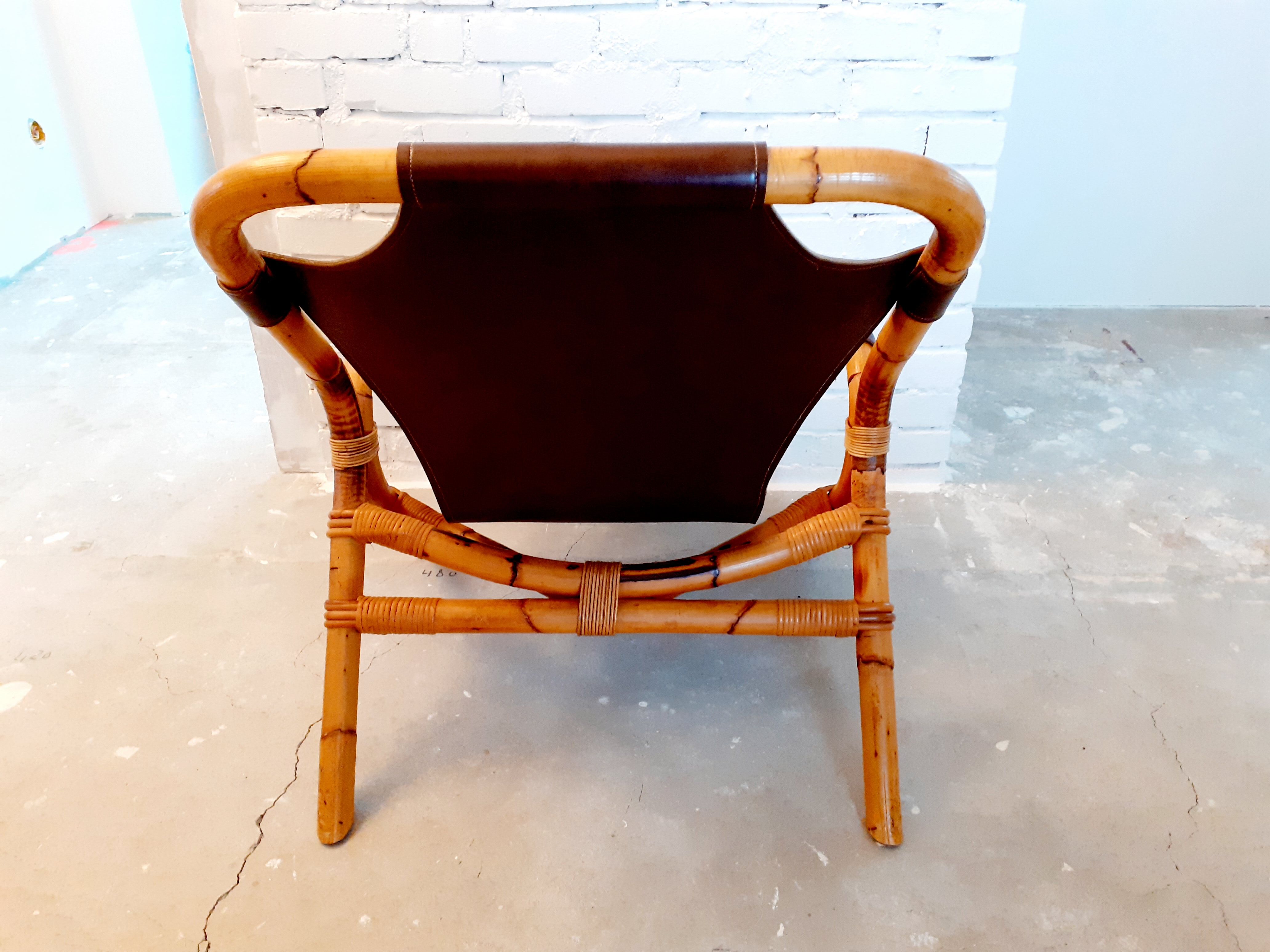 Vintage armchair in rattan and imitation leather 60s