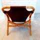 Vintage armchair in rattan and imitation leather 60s