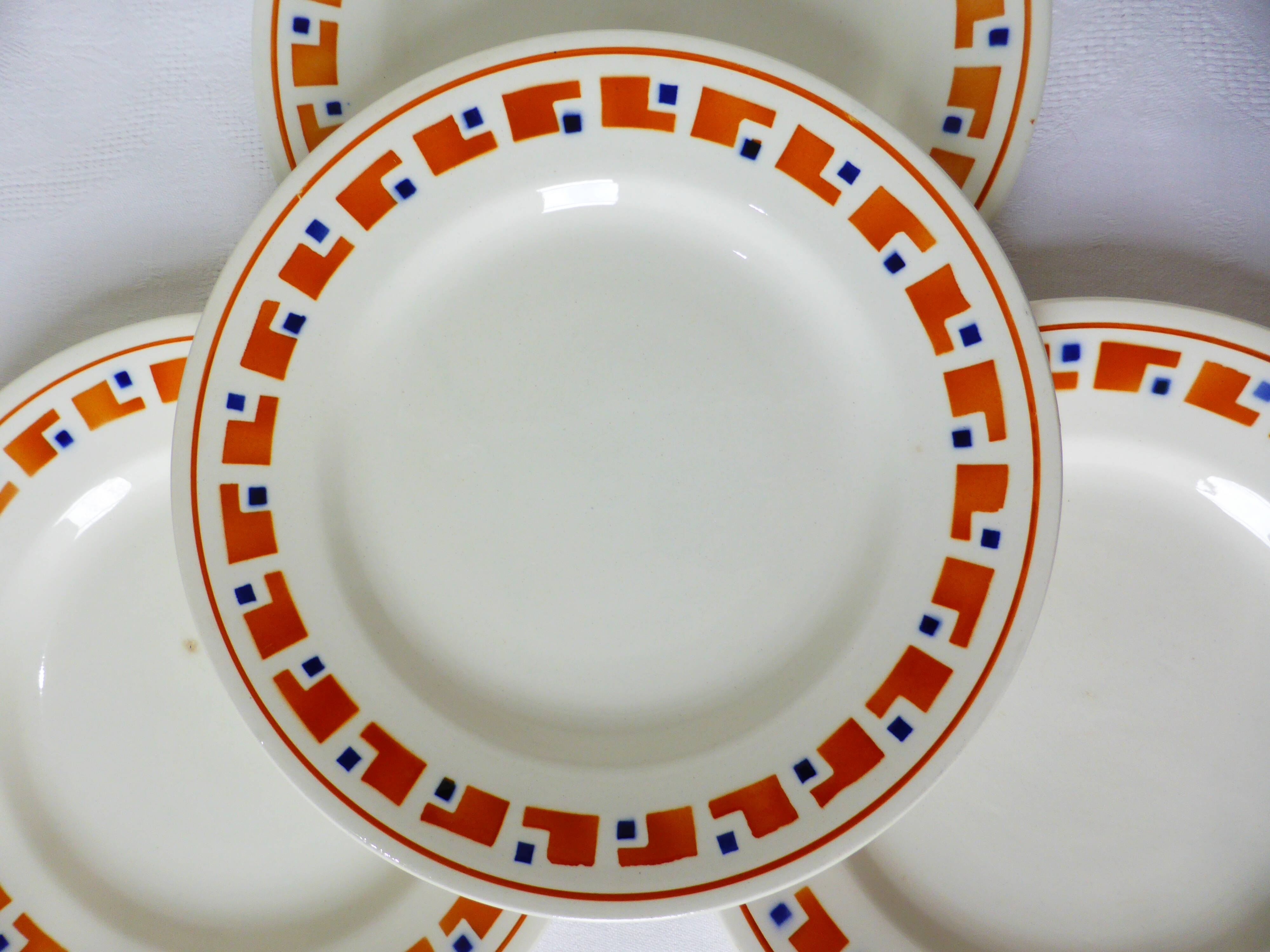 4 flat plates in iron earth from Salins, Lucette model 210809
