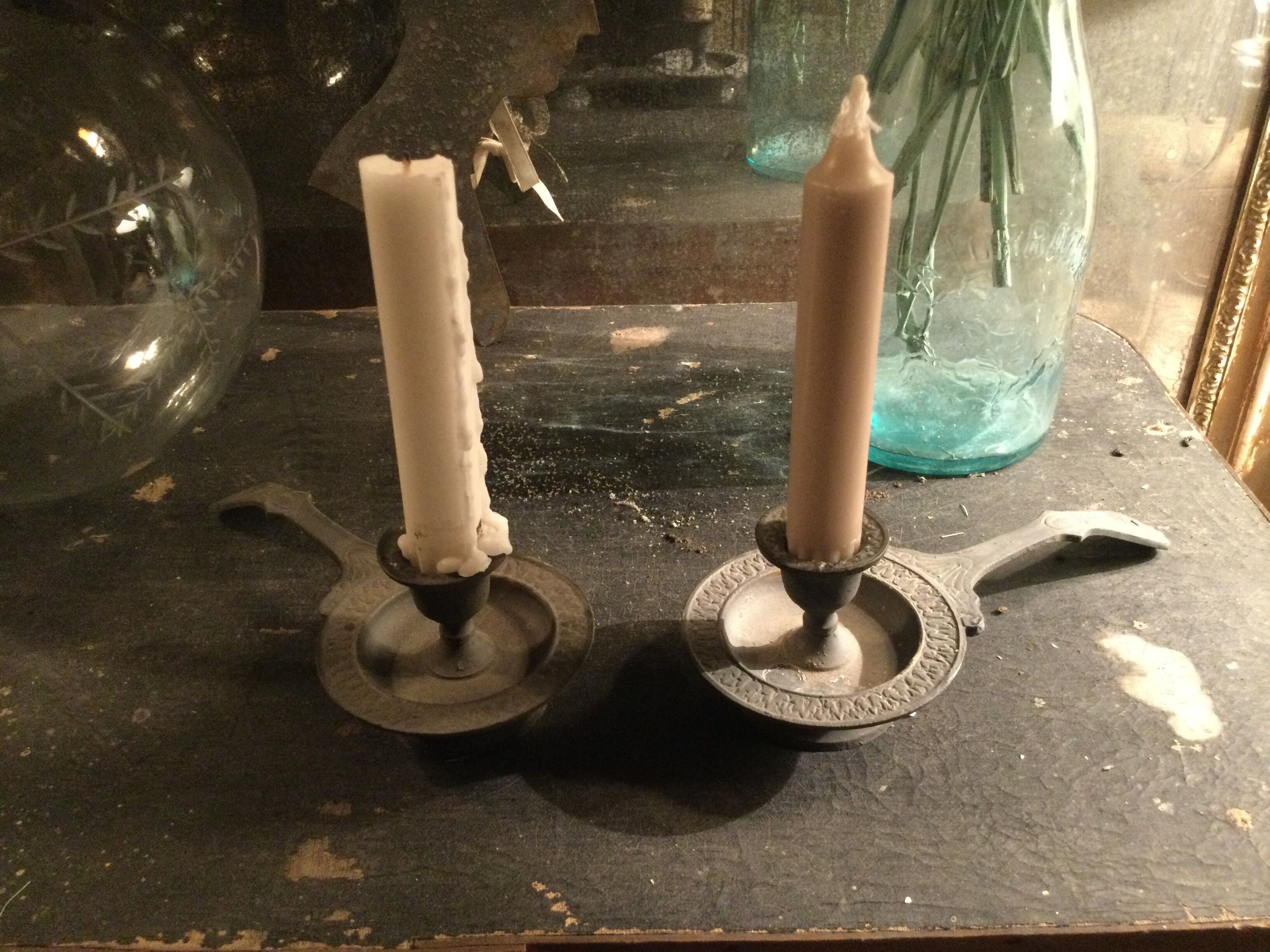 Pair of cast iron candle holders