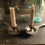 Pair of cast iron candle holders
