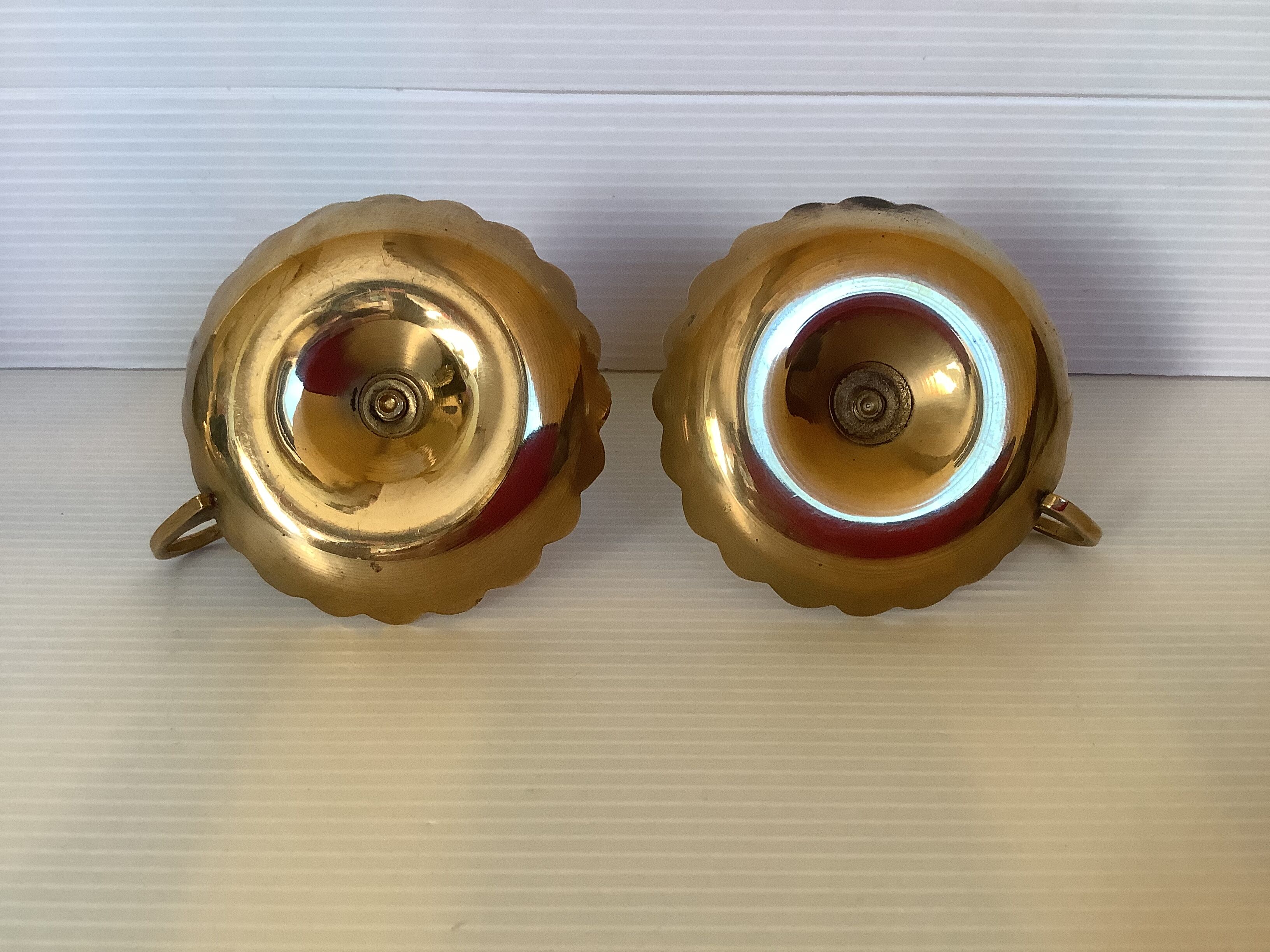 Pair of brass cellar rat candle holders