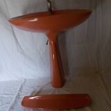 Vintage sink and its orange shelf