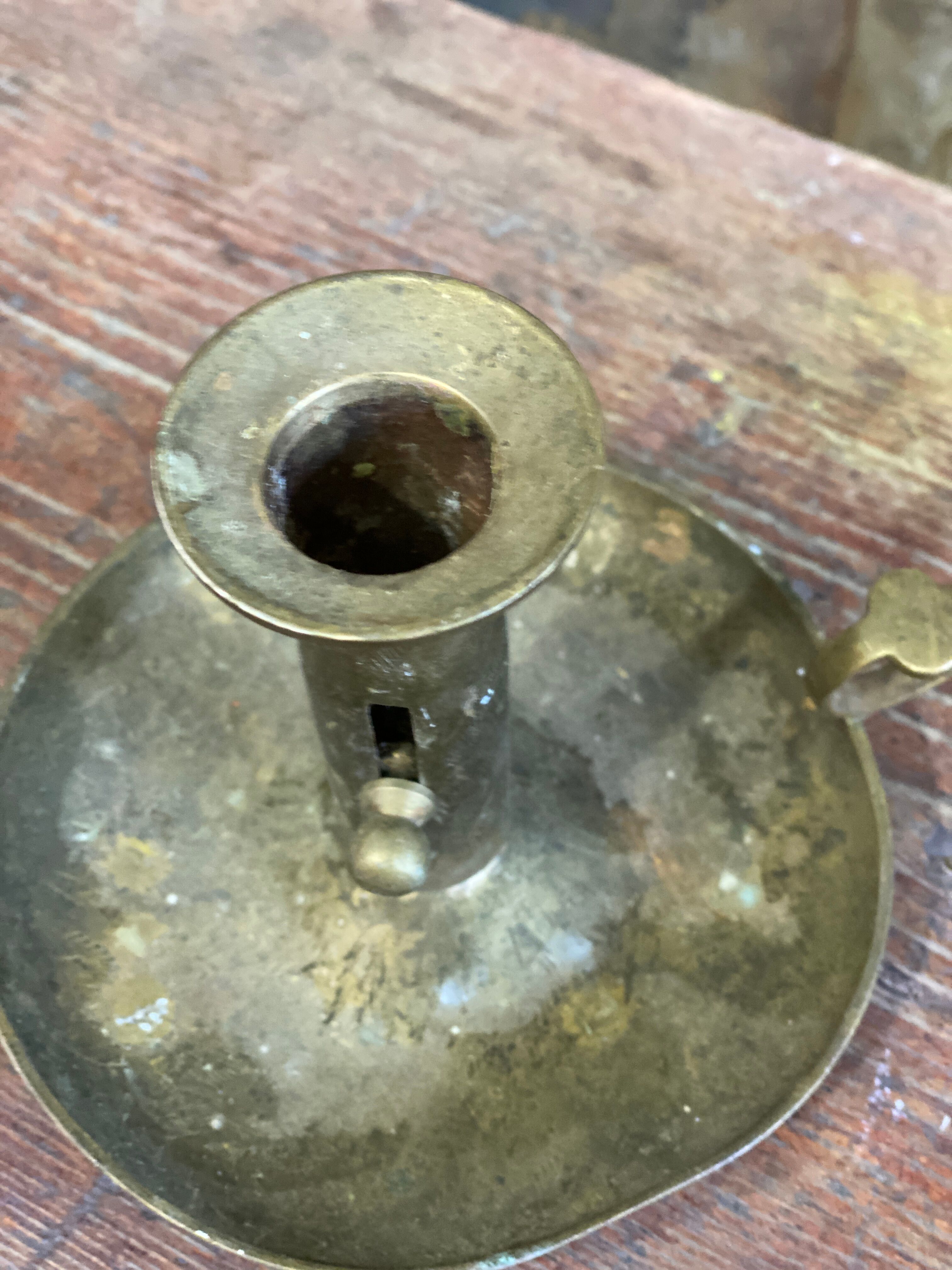 Brass hand candle holder