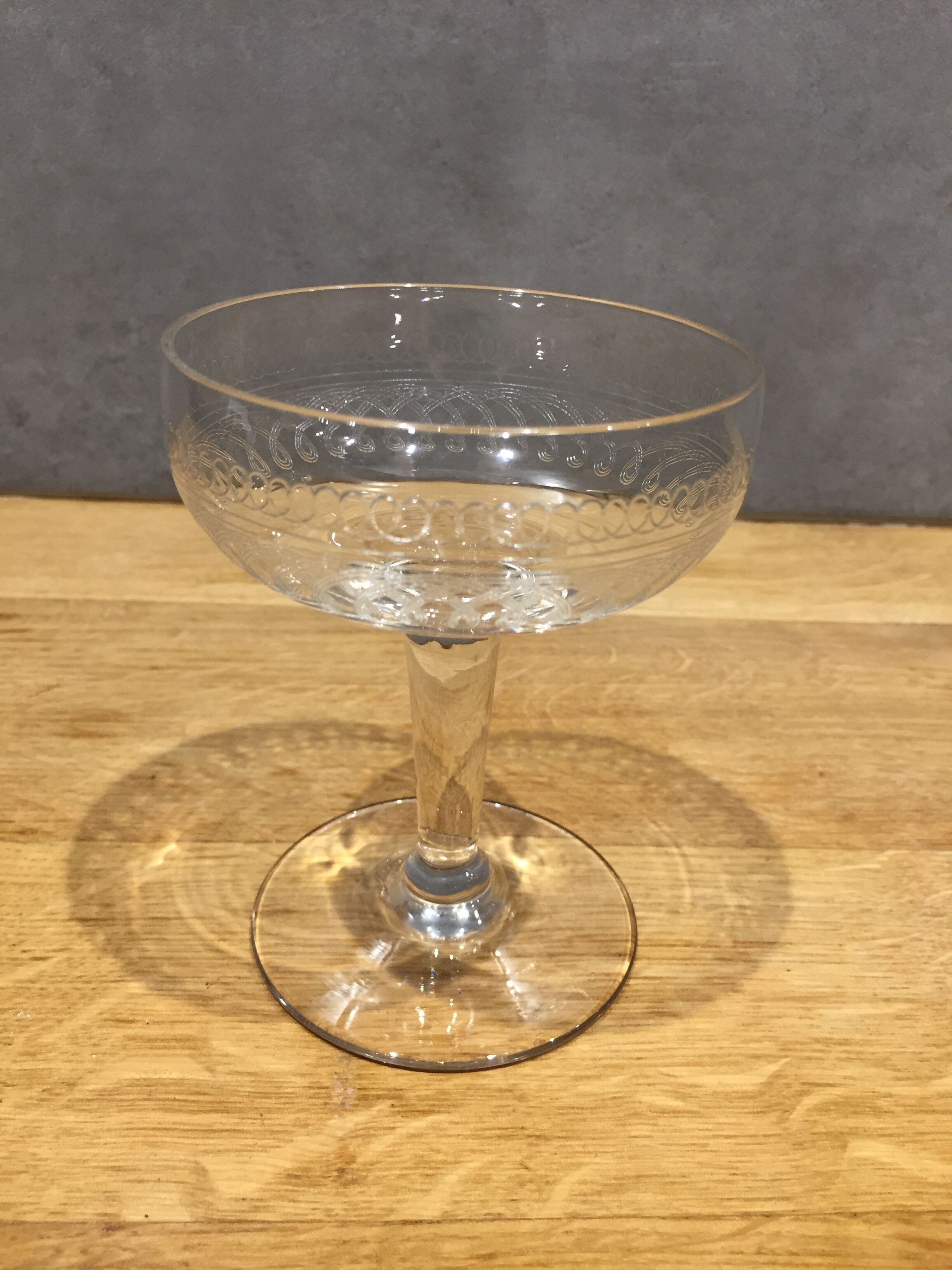 Series of 5 old and engraved champagne glasses