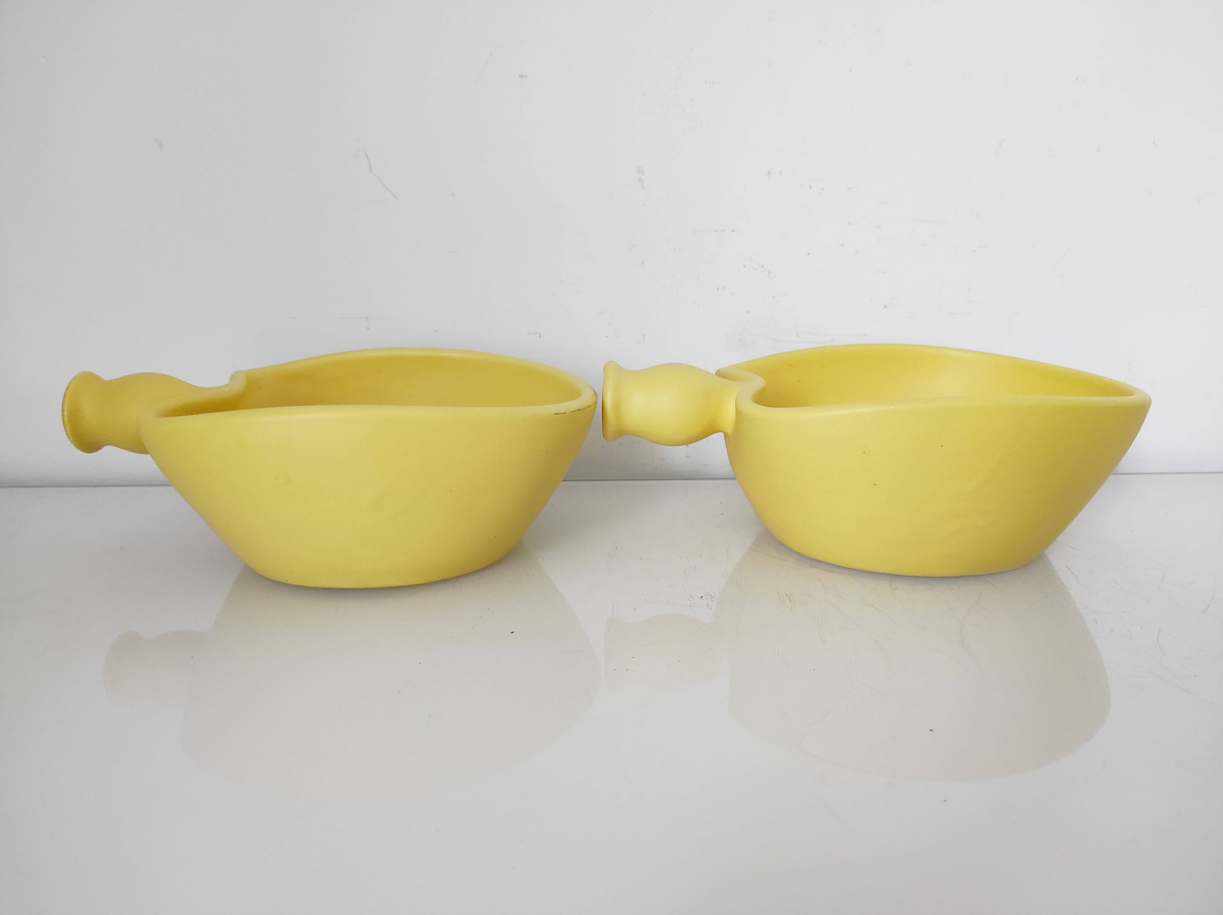 Two yellow ceramic dishes