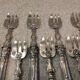 11 silver oyster forks, 800 Minerva style, Louis Philippe
