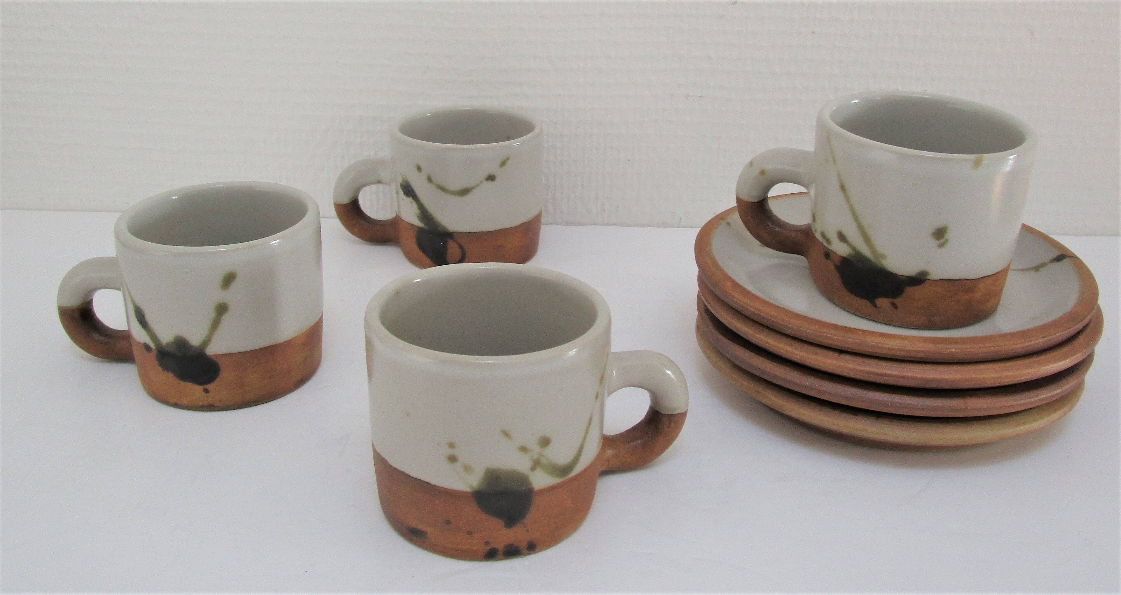 Four pottery cups and saucers from La Colombe Vallauris