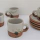 Four pottery cups and saucers from La Colombe Vallauris