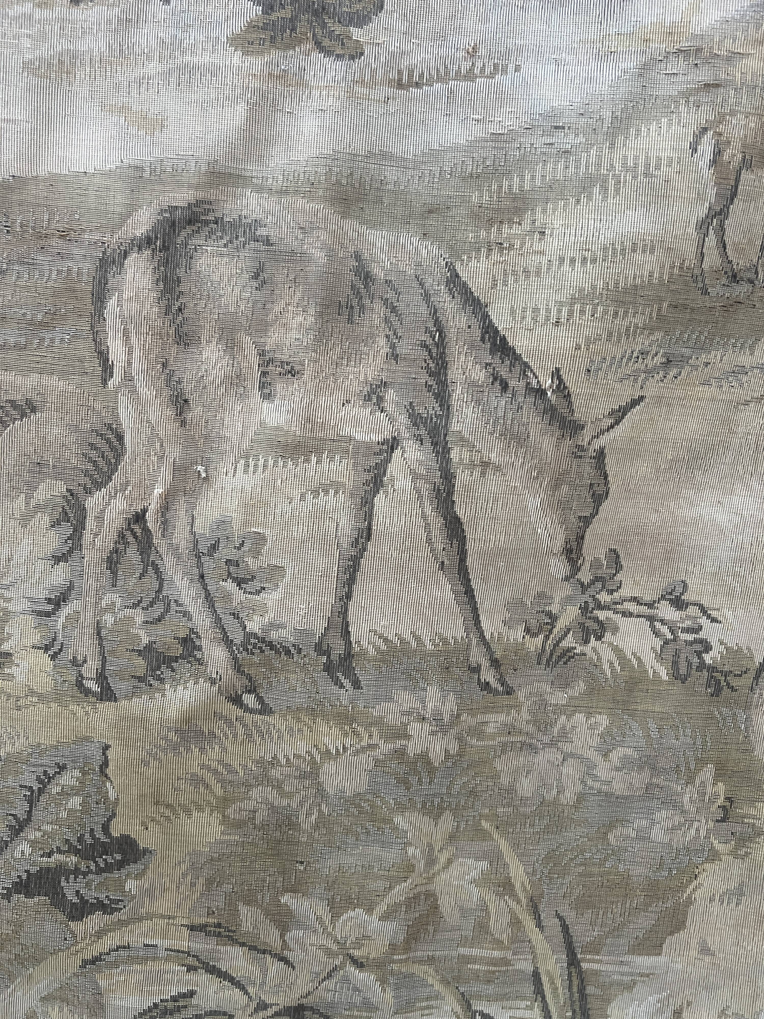 Renaissance-style tapestry with animal motifs, 20th century.