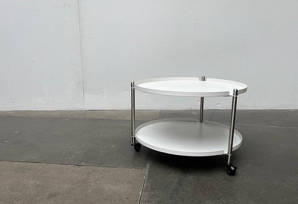 Minimalist Thrill metal coffee table or side table with wheels by Leitmotiv.
