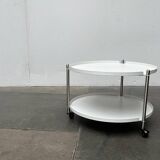 Minimalist Thrill metal coffee table or side table with wheels by Leitmotiv.