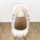 Bamboo bassinet on a stand, bohemian 1970s.