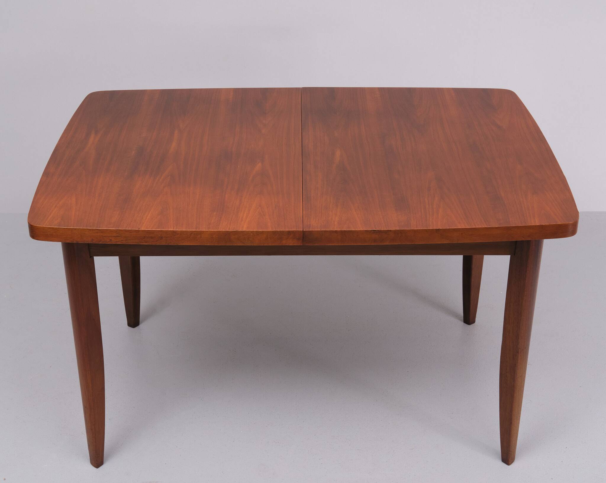 Extendable dining table in walnut wood by Jindrich Halabala 1960