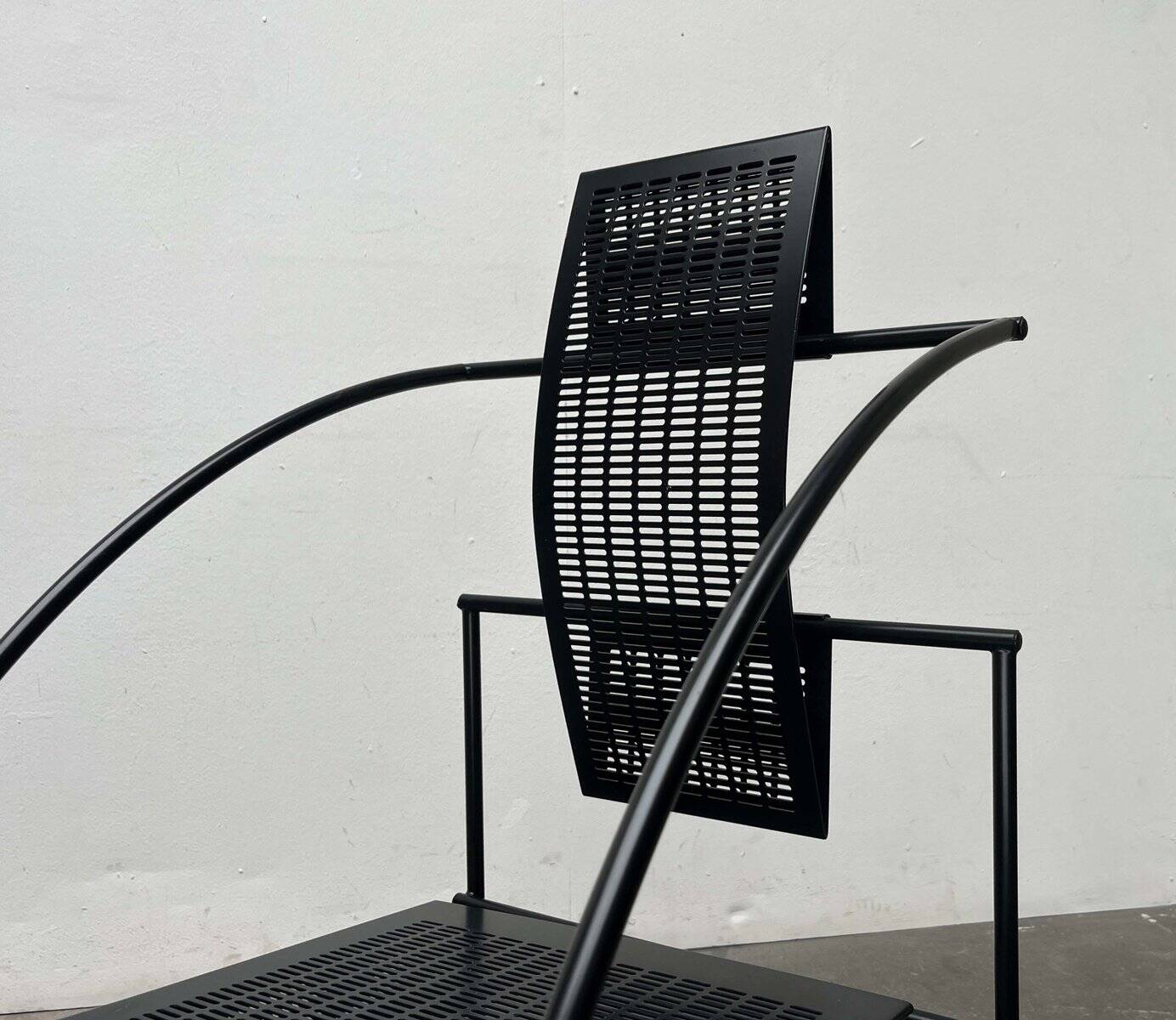 Postmodern black Quinta chair in perforated metal by Mario Botta for Alias, 1980s.